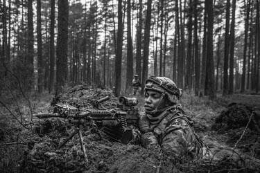 An US Army soldier dug in at a machine gun position before a battle during NATO Iron Sword joint exercises.