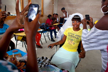 Djenise Hilaive takes part in a hair and make-up training session in Port-au-Prince, Haiti.