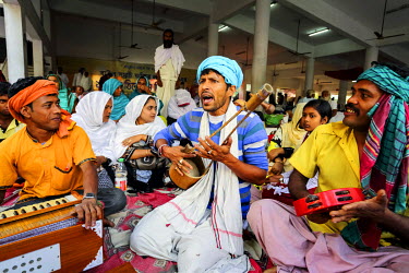 Folk singers performing at the Lalon Mela, a musical festival celebrating the death of Lalon Shah, a Bengali Baul mystic and saint whose teachings are followed by both Hindus and Sufi Muslims.