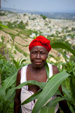 Mary France Dorlas, who lives in Grand Ravine and has received seeds, tools and training so she can farm land at the top of the ravine.