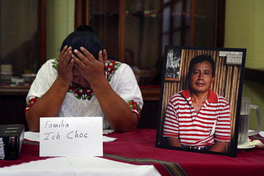 Angelica Choc, widow of anti-mining activist and La Union community leader Adolfo Ich Chaman (in photograph), cries as she speaks during a press conference during the landmark Choc v. HudBay case whic...