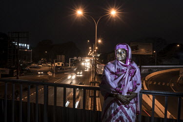 Hadja Rabi Diallo on the bridge from which her husband was hanged on the orders of President Sekou Toure in 1971. 'My husband was Ousmane Balde, the finance minister. Sekou Toure accused him of wantin...
