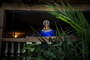Hawa Drame outside her old house where she found out her father had been arrested. The government of Sekou Toure went on to execute her father and confiscate the house. 'My father was an early Guinean...