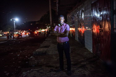 Mamadou Bilal Guisse at the spot where he was arrested and subsequently tortured on 23 October 2010.'I was arrested in 2010 by Sekouba Konate's presidential guards. I was working in the shop when the...