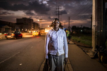 Moussa Mara beside the drainage ditch where he was shot by the security forces on 22 January 2007. 'I was standing in front of my business, a motorcycle shop, with two friends. I heard rumours soldier...
