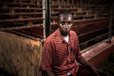 Mamadou Saliou Diallo at the exit to the national stadium where he was almost crushed to death during the massacre of 28 September 2009. 'I was in the stands when they started shooting. Then the perso...