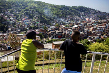 Residents look out over Complexo do Alemao in the North Zone.