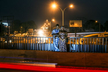 Ousmane Balde with his sister on the bridge where his grandfather was hanged by the Sekou Toure regime in 1971.'I never even knew my grandfather (also called Ousmane Balde), and I only know his face f...