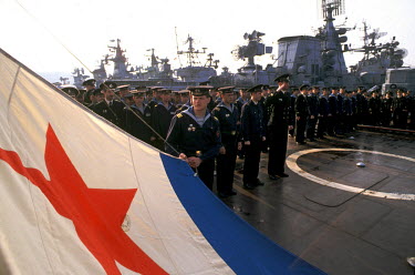 A flag ceremony on the deck of a Black Sea fleet naval vessel. A key factor in the struggle between the Ukraine and Russia over the Crimea Peninsula following the collapse of the Soviet Union centered...