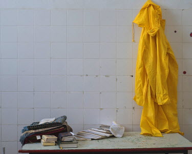 A rain coat and copies of the Quran in a building in the closed down refugee camp at the Port of Lakki.   The camp was opened by volunteers in the summer of 2015 and later that year UNHCR and MSF expa...