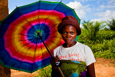A woman with colourful umbrella.