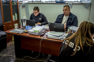 Diana Sarzinski (left) at work at a mortuary facility in Visoko where the International Commission on Missing Persons (ICMP) are working to identify the remains of unidentified victims of the Bosnian...