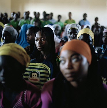 Youths gather for a presentation of a program against child marriage. At the event groups are formed of 10 boys and 10 girls called: 'espaces' where they will discuss topics like marriage, sexuality,...