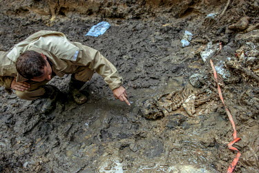 The skeleton of a Bosnian Muslim man executed during the Bosnian war is exhumed from a mass grave in Republica Srpska. It is suspected that the men were murdered during the Srebrenica massacre in 1995...
