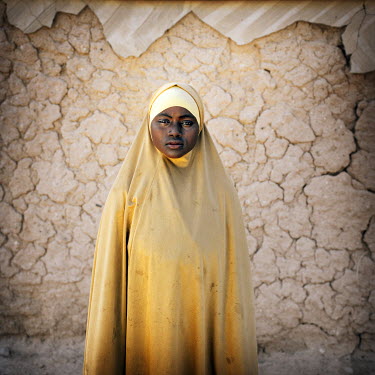 Halima, 17, got married one year earlier and quickly after got pregnant. Her baby boy is now six months old. She never went to school and is happy with her husband.