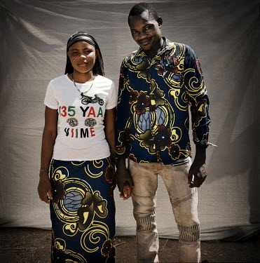 Kompoa Fimba, 17, (L) and Andre Fimba, 27, have been married for one year. They don't want children, yet. Kompoa left school when she got married but returned after a few months. Her husband agreed to...