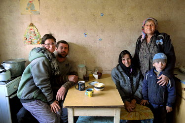 The Pereverzev family, from the left: Ira (30), Sasha (37), Ola (80), Maria (56) and Artyom (5). The Pereverzev family is originally from Horlivka, they escaped the fierce fighting near their home two...
