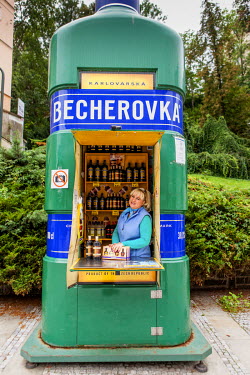 Tatyana Gutnova (48) selling Becherovka, a herbal bitters drink. Originally from the Ukraine, she has been living for 20 years in the Czech Republic.
