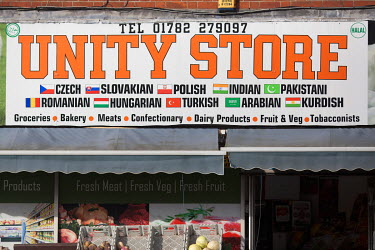 A shopsign for the Unity Store where products from numerous East European, Middle Eastern and South Asian countries are sold.