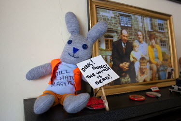 A soft toy, dressed as a striking coal miner, holds a placard celebrating the death of Margaret Thatcher in the home of Leonard Bradbury (currently unemployed after suffering a workplace injury) at hi...