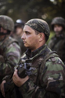 Members of the aggressively nationalist paramilitary, Slovenski Branci, training in the forest, a two hour drive from the Slovakian capital. Youths in the group, some as young as 15, learn to defend t...
