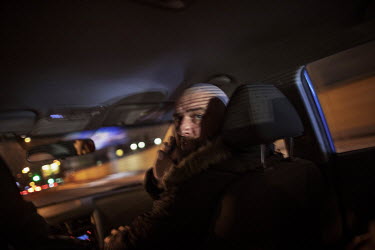 Self-proclaimed neo-nazi Evgenij Stojka in a car with friends on their way to drink beer and vodka in a bar near where he grew up in Kiev. 'I used to beat up immigrants. It didn't matter if it was Jew...