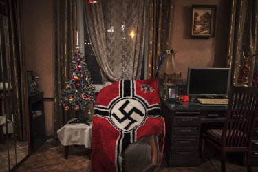 A part-finished blanket with a swastika design in the home of 'John Wagner', a leader of the  National Socialist group KNS (Committee for Nation and Freedom).