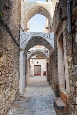Ornamental arches adorned with xysta (sgraffito) motifs in the village of Pyrgi, known as the 'painted village' on account of its decorated houses. The village has kept its medieval style and, togethe...