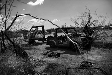 The abandoned remains of vehicles in the middle of Slab City, a squatters' camp about 190 miles southeast of Los Angeles.   Slab City, known as The Slabs, is named for its areas of concrete where for...