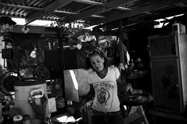 Rene, from Los Angeles, from where, about six months ago, she relocated to Slab City, a squatters' camp about 190 miles southeast of Los Angeles. She now runs the Ponderosa which provides hospitality...