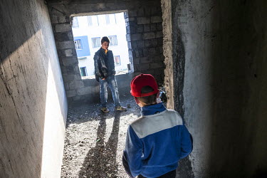 Children playing in an abandoned building.