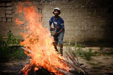 Jean stands beside a bonfire. The 12 year old lives with his parents, bothers and sisters in a small village where he dreams of becoming a fire fighter. The closest fire station is 22km away and there...