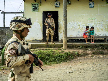 Armed soldiers from the Colombian national army stationed near Corinto as part of the UN mission as prescribed by the peace accord between the Colombian government and the FARC.   The area was until r...