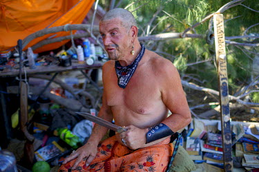 '77', one of the so-called 'Pirates' of Slab City, a squatters' camp about 190 miles southeast of Los Angeles, who has been living in the Slabs for the past two years.   Slab City, known as The Slabs,...