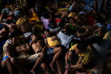 Inmates are seen in the overcrowded Quezon City Jail, where 2072 of the 3036 inmates are held on drug-related offences.