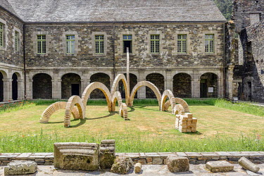 A sculpture displayed in the courtyard of the 12th century Abbaye de Bon-Repos.