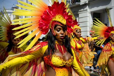 Dancers take part in the parade at the Notting Hill Carnival.