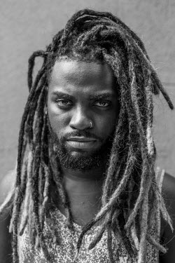 Vitor Cezar, 26, Director of Samba music at Portela Samba School.   'I play samba and all the musicians have short hair. But I like to be different than the group. I've had my dreads since 2008. Eu so...