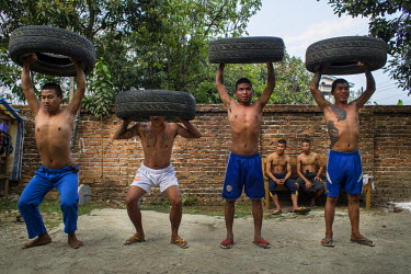 Inmates do intense physical exercises as part of their everyday routine at the Du Ka Htout Pat Jasan centre.  Pat Jasan is a church-based anti-drugs organisation that operates with no official authori...