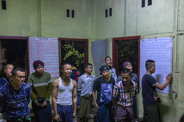 Young drug addicts, mostly ethnic Kachin, sing devotional songs while a youth volunteer plays guitar during devotion time at a Pat Jasan detention centre for drug addicts.  Pat Jasan is a church-based...