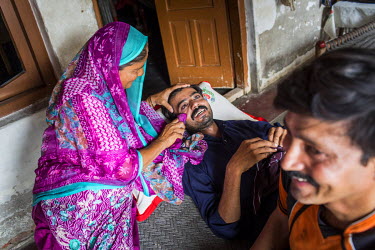 Murtaza Ghulum (30) is welcomed home after his operation by his mother Shahnaz Bibi, in Dhadda Kharu, near Pindi Bhaddian. Murtaza suffered from bilateral cataracts and was forced to leave his job in...