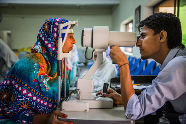 Kausar Shaheen has her eyes examined before her cataract operation at the LRBT Eye Hospital in Mandra.