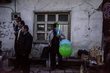 A street vendor sells balloons and LED nightsticks to the hundreds of people attending the Wedding of Selve Kuivashi and Djamal Vurdal.