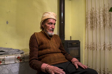 89 year old Reza at his home in a remote mountain village. Despite much of his village fleeing during the Soviet era, and being forcibly made to change his family's name from an Islamic one to a Bulga...
