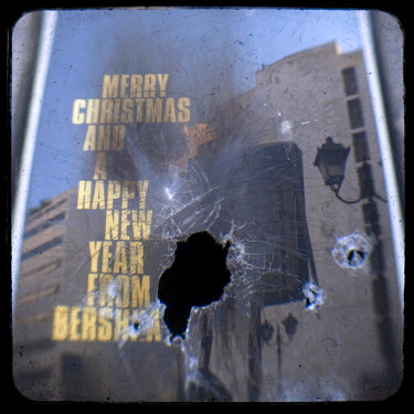 The smashed window of a Bershka shop on Ermou Street.   Following the murder of a 15 year old boy, Alexandros Grigoropoulos, by a policeman on 6 December 2008 widespread riots, protests and unrest fol...