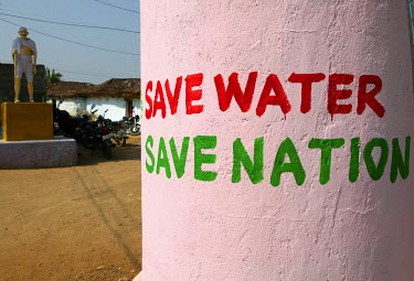 A slogan on a wall in Ibrahimpur village exhorts people to save water.