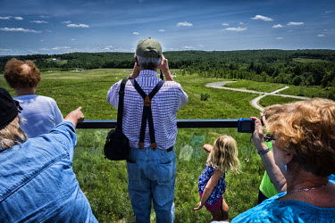 A family visiting the memorial to Flight 93, the 'fourth plane' that crashed after being hijacked during the terrorist attacks of 11 September 2001.