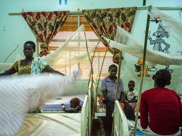 Mothers and children at the Al Sabbah Children's Hospital in Juba where children suffering from severe malnutrition are undergoing treatment. South Sudan has been in a state of civil war since Decembe...