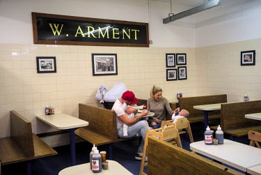 A family eats lunch at Arment's Pie and Mash shop.