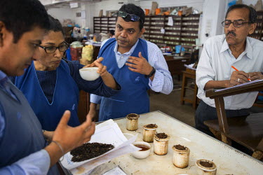 Tea tasters at J.Thomas & Company. Established in Calcutta in 1861, when the capital of British India was the main port for the export of tea to Britain, they are the largest and oldest existing tea a...